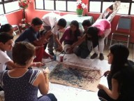 Katie and Andrea giving tips on painting like Jackson Pollock.