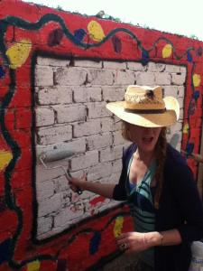 Celia Jameson preparing to paste on a photo.